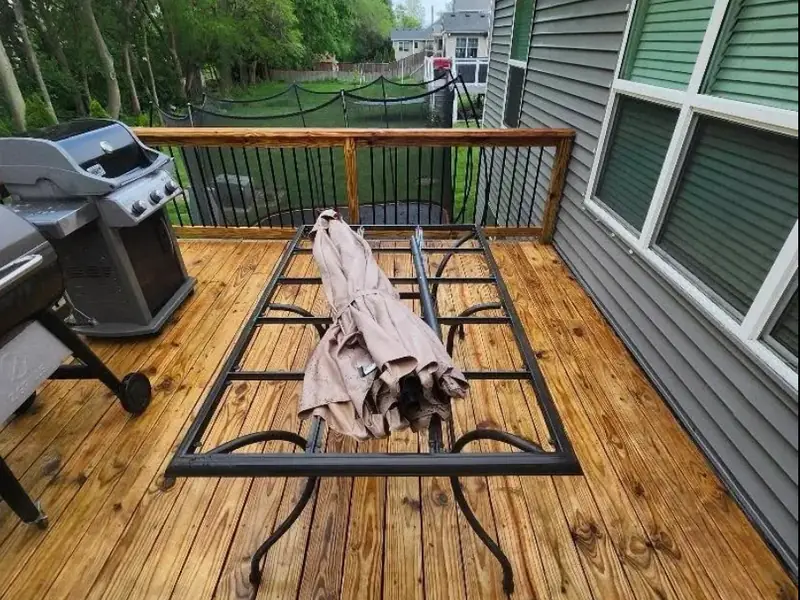 Deck boards golden and clean after pressure washing